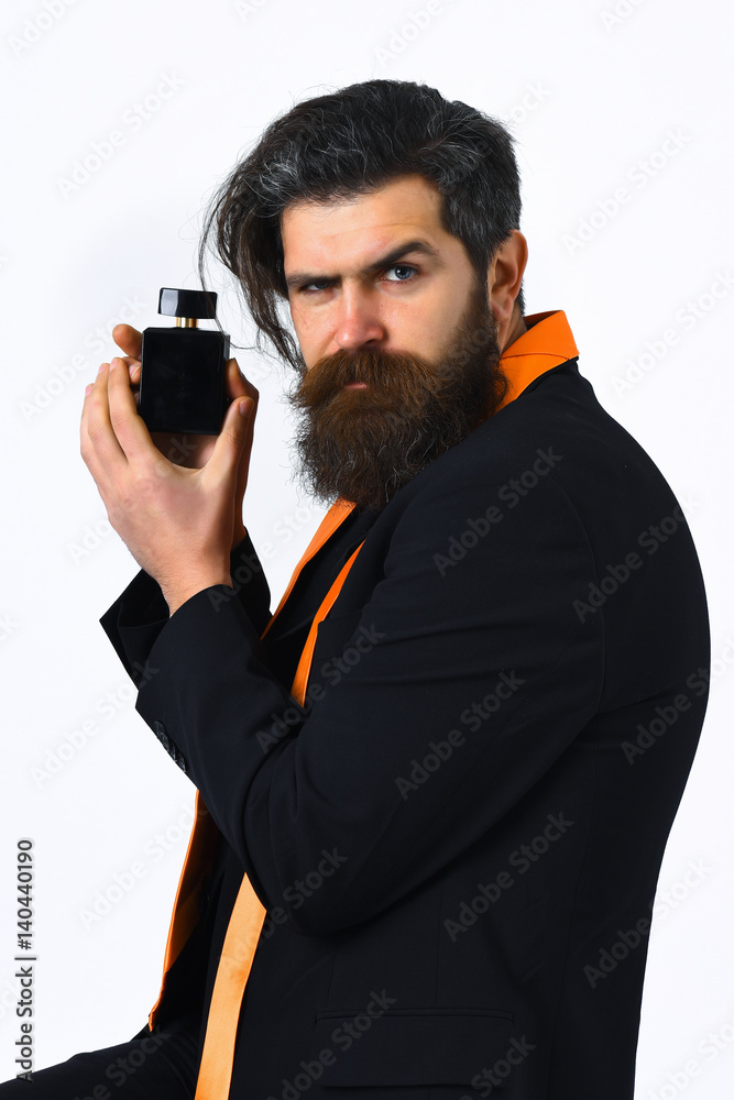 caucasian hipster in suit holding perfume caucasian hipster in suit holding perfume