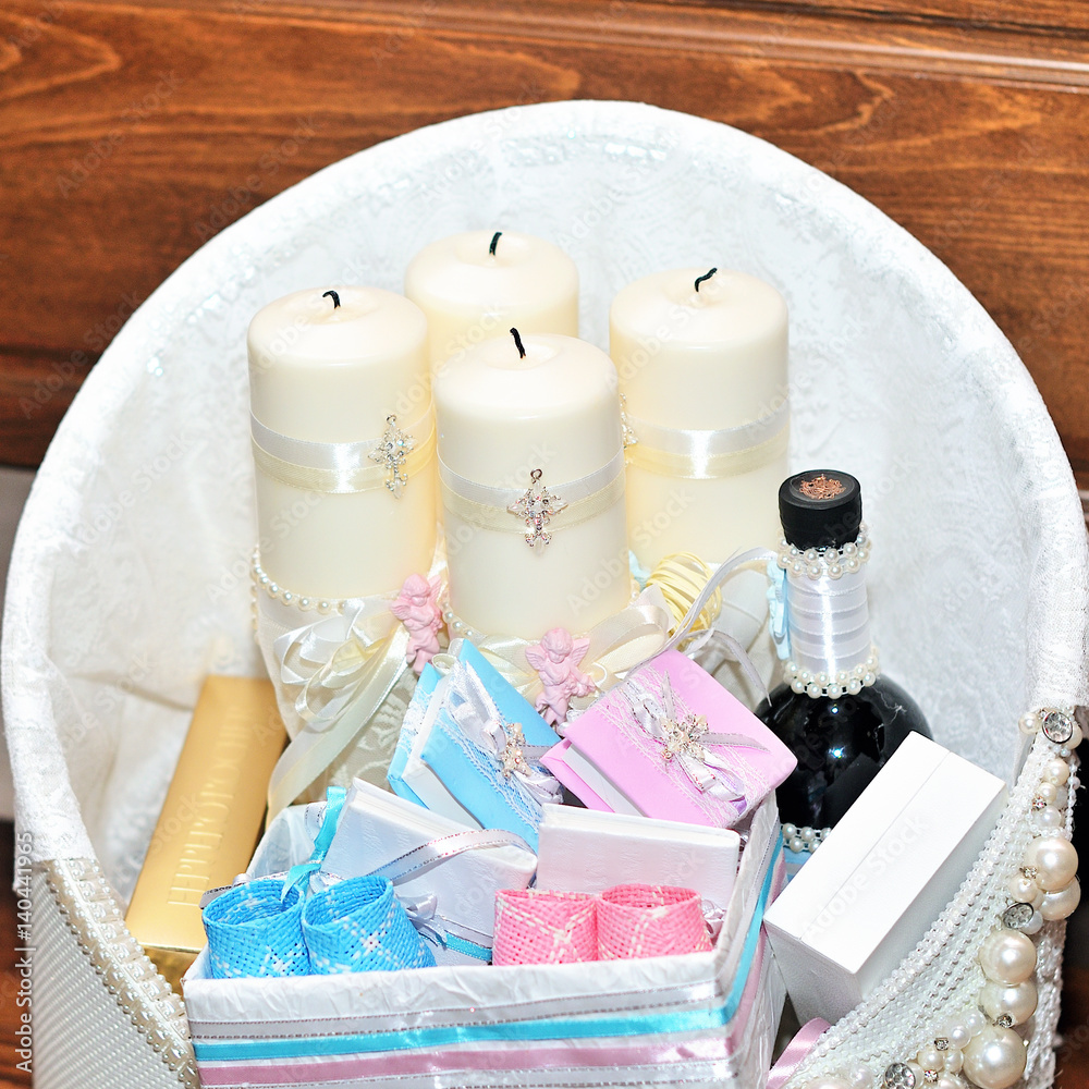 Candles during orthodox christening baptism. Candles during orthodox christening baptism.