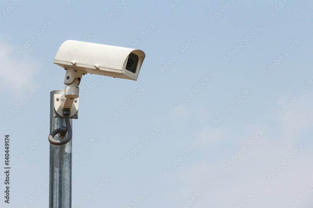Security cameras or CCTV against sky Security cameras or CCTV against sky