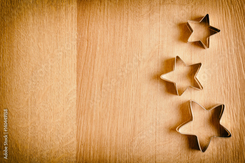 A wooden background with beautiful stars. Suitable for decoration of a holiday