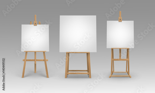 Set of Brown Sienna Wooden Easels with Mock Up Empty Blank Canvases Isolated on Background