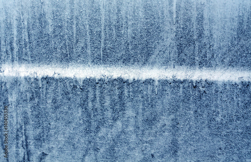 dirty blue car surface.