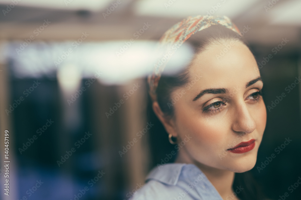 Portrait of exhausted young woman looking away Portrait of exhausted young woman looking away