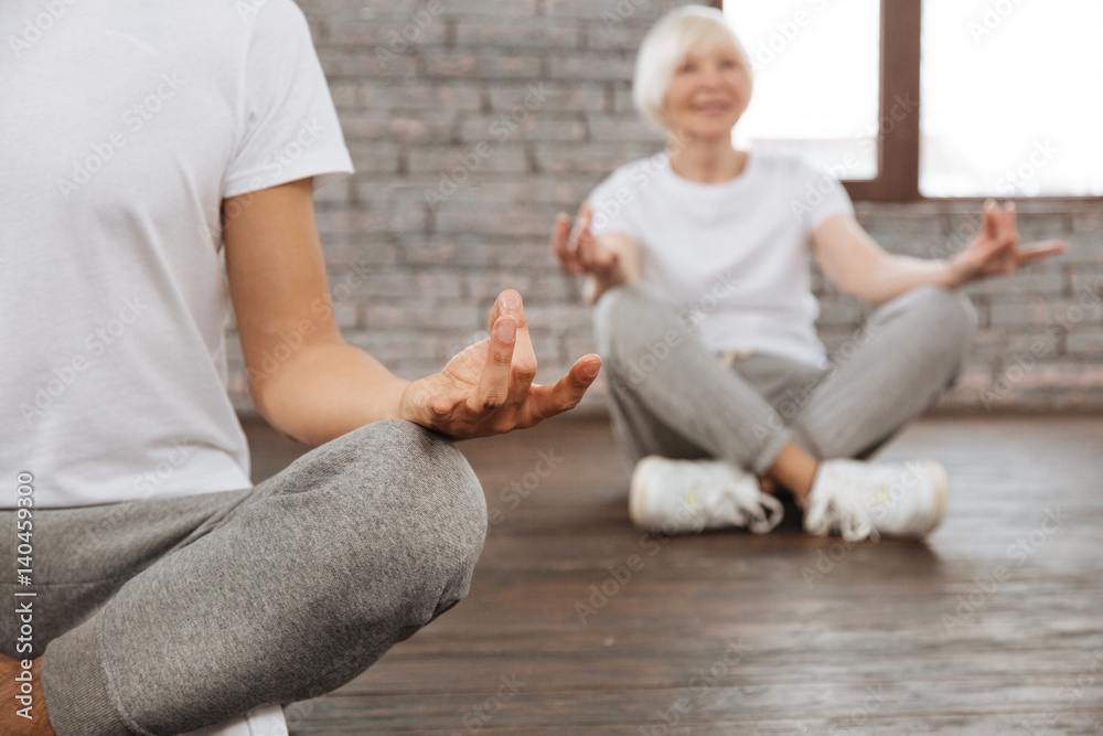 Close up of relaxed fingers being in the air