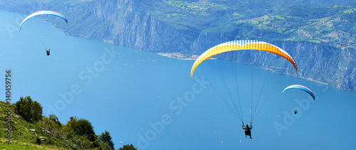 Photo Paragliding is a popular activity on Lake Garda