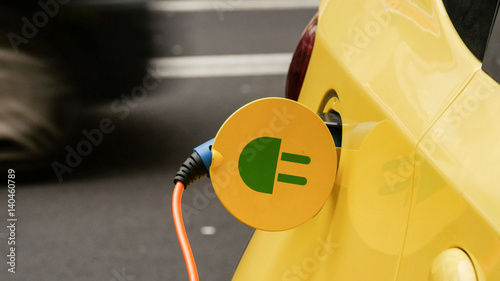 Power supply for electric car charging. City electric car charging station. Close-up.
