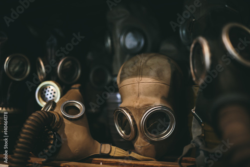Pile of old Soviet era gas masks on a shelf