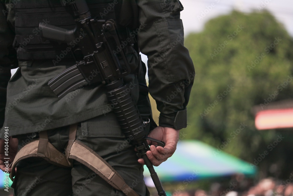 Soldier, commando standing, ready for protection Soldier, commando standing, ready for protection