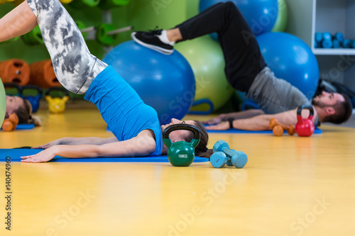 Group of people in a Pilates class at the gym