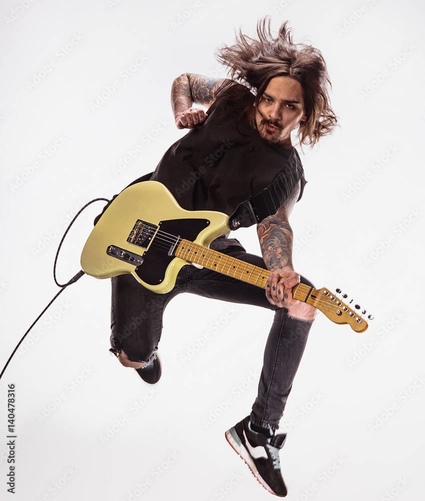 Fototapeta premium Guitarist plays guitar.