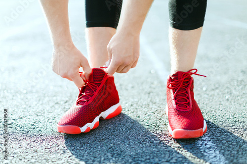 Man in red sneakers