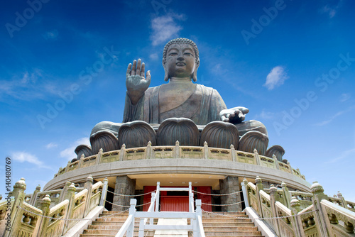 HONG KONG, CHINA - MARCH  7, 2014: The enormous Tian Tan Buddha at Po Lin Monastery at Lantau island