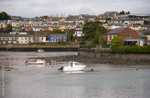 Boats in Kinsale harbor and the houses on the hill