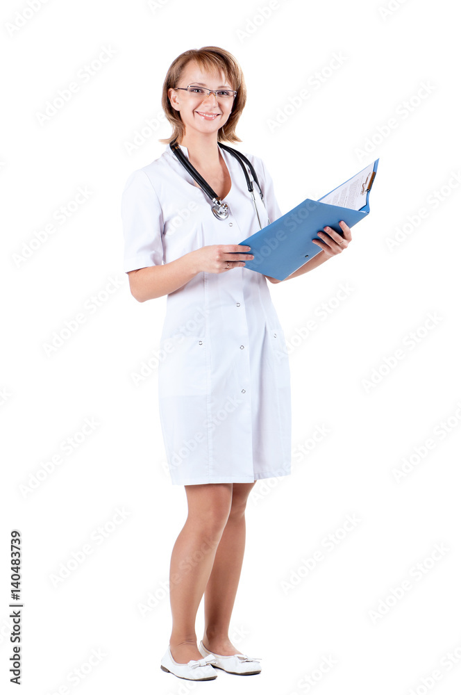 Full body portrait of a beautiful young doctor with file folder and stethoscope in hospital Full body portrait of a beautiful young doctor with file folder and stethoscope in hospital