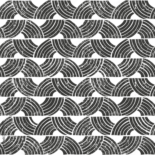 Seamless tribal pattern with grunge effect. Hand drawn background. EPS10 vector illustration in linocut style.