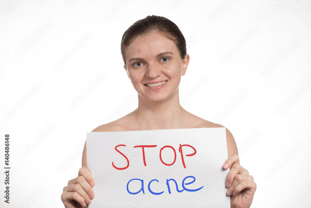 Beautiful young girl with red and white acne on her face. Before and after cream with sponge on a white background. Beautiful young girl with red and white acne on her face. Before and after cream with sponge on a white background.
