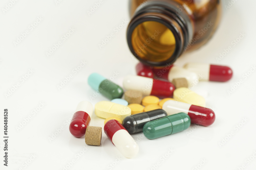 capsule and bottle on white background capsule and bottle on white background