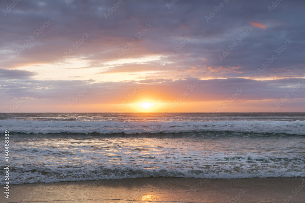 Cloudy and colourful beach sunrse on the Gold Coast