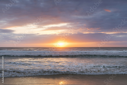 Cloudy and colourful beach sunrse on the Gold Coast