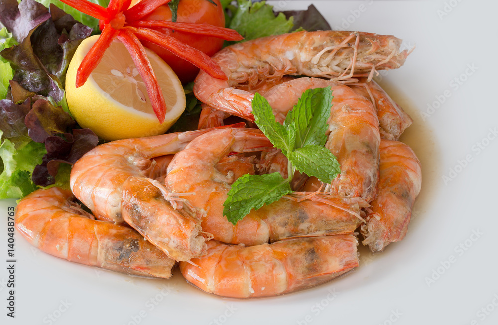Shrimp boiled with honey and salt on white background Shrimp boiled with honey and salt on white background