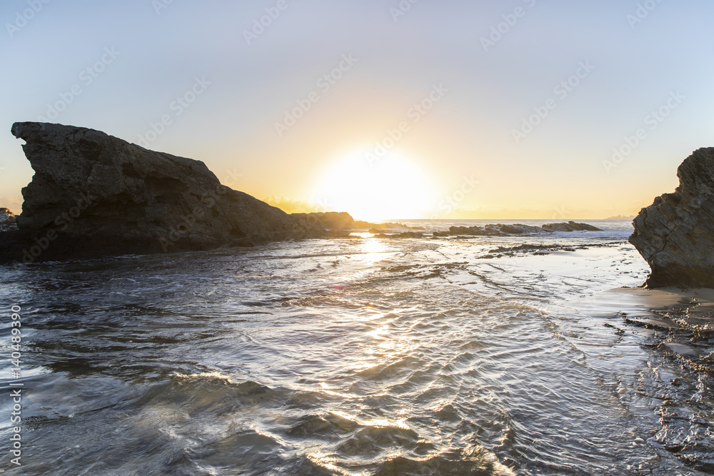 High ocean tide across Currumbin Rock Gold Coast during sunrise.