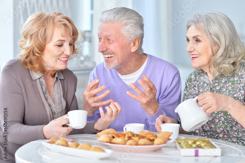 Elderly people having breakfast