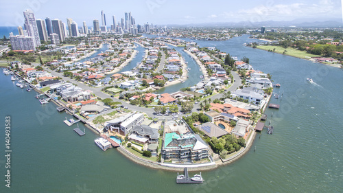 Aerial view of Macintosh Island waterfront properties, facing south with Surfers Paradise in the horizon