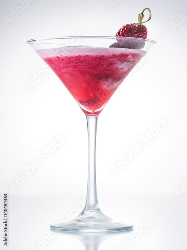 Cocktail clover club with raspberries on a light background