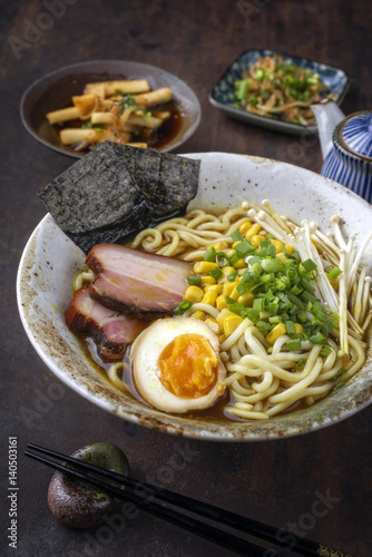 Traditional Japanese Ramen Yakibuta with Enoki and Egg as close-up in a bowl
