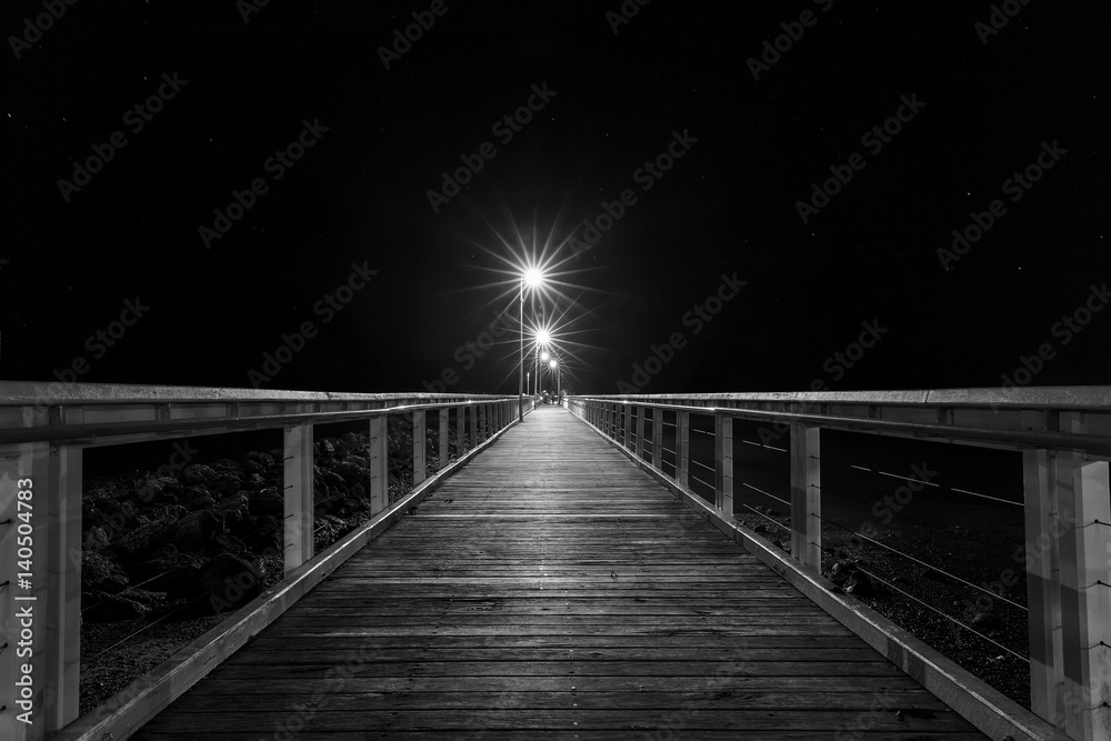 Obraz premium Wellington Point jetty and night lights - black and white