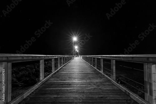 Wellington Point jetty and night lights - black and white