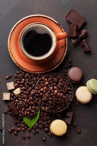 Coffee cup, beans, chocolate