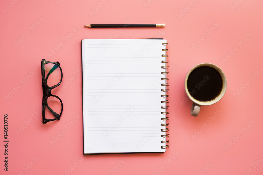 Flat Design of Workspace desk with blank notebook pencil glasses and coffee on Vintage pastel color background. Flat Design of Workspace desk with blank notebook pencil glasses and coffee on Vintage pastel color background.