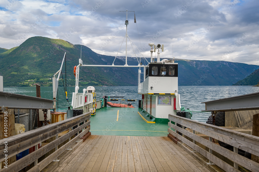 Small norwegian ferry docked