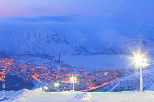  Kirovsk, Russia. Night city. Winter mountain landscape. photo