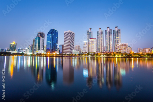BANGKOK  THAILAND  FEBRUARY 11  2017 - Panorama of cityscape with skyscrapers and sky line by night from Benjakitti Park in Bangkok  Thailand