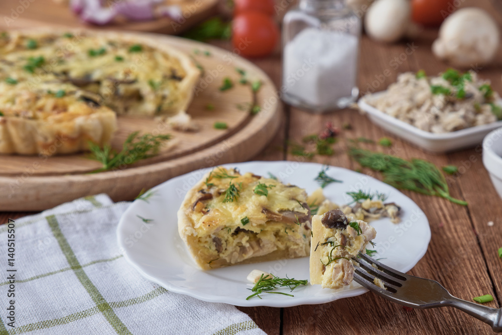 Traditional french quiche pie with chicken and mushroom