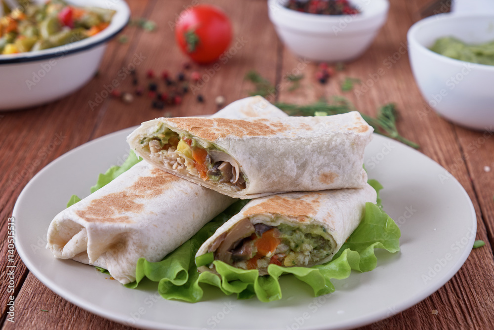 Burito with chicken mushrooms and vegetables