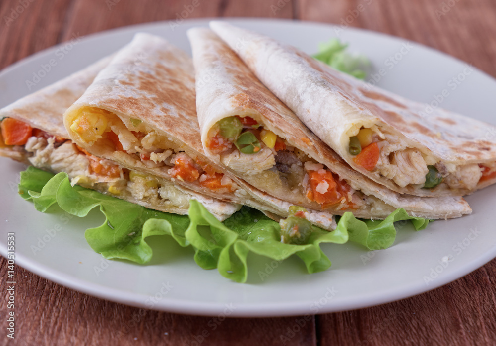 Quesadilla with cheese, chicken, mushrooms and vegetables Quesadilla with cheese, chicken, mushrooms and vegetables