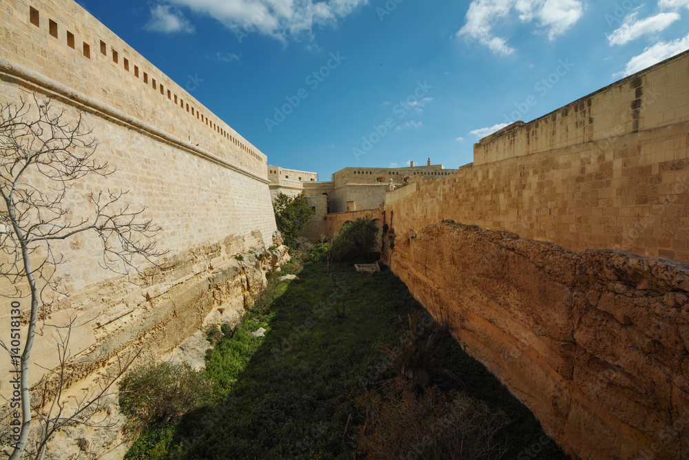 the defense wall of the ancient fortress of Valetta on Malta in South Europe