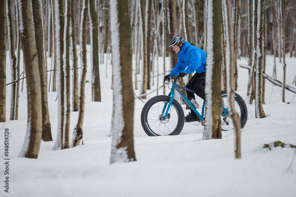 Fat biker riding in the snow Fat biker riding in the snow