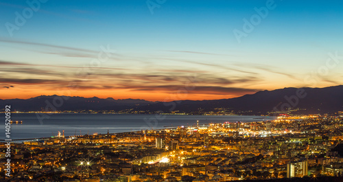 GENOA (GENOVA), ITALY, MARCH 10, 2017 - Aerial view of the city of Genoa (Genova) at dusk.