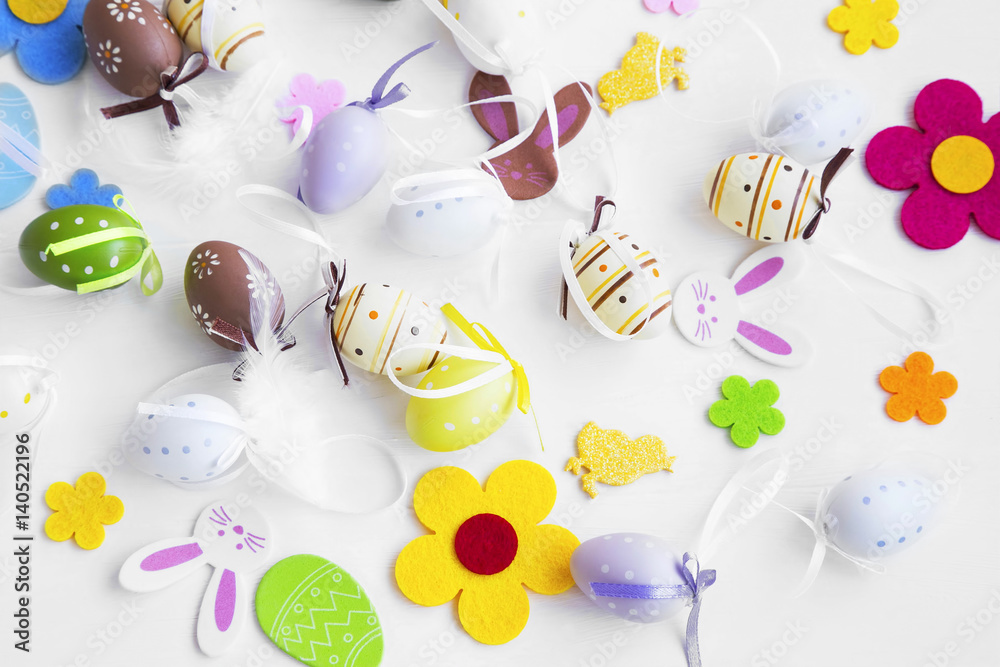 Easter eggs, bunnies, flowers and feathers decorations
