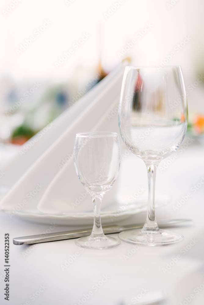 Crystal glasses for wine on a festive table Crystal glasses for wine on a festive table