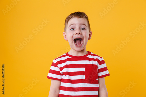 Portrait of a little boy shouting photo