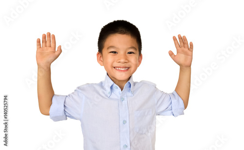 Cute asian boy put his hand up isolated on white background.