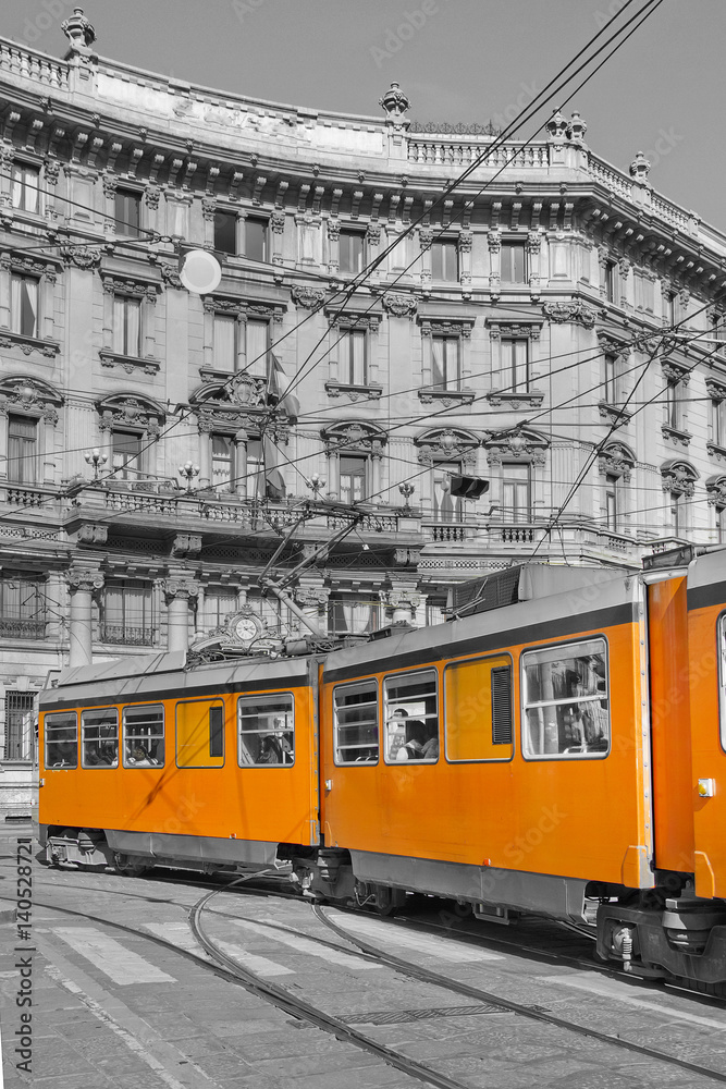 milano e tram arancione in piazza cordusio lombardia italia europa