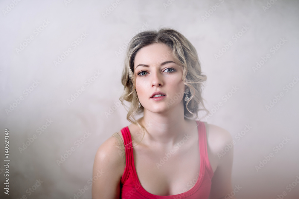 Portrait of pretty young woman against grunge background Portrait of pretty young woman against grunge background