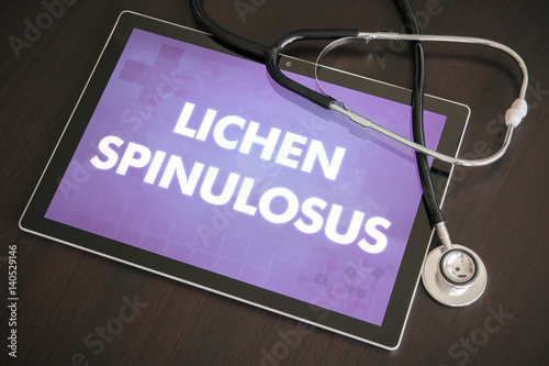 Lichen spinulosus (cutaneous disease) diagnosis medical concept on tablet screen with stethoscope photo