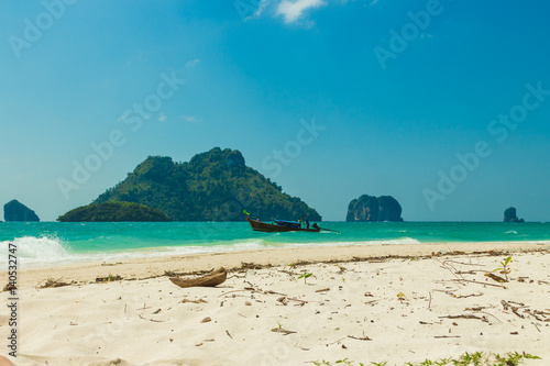 Fototapeta Naklejka Na Ścianę i Meble -  Poda island (Koh Poda) beach with traditional thai longtail boat and islands in Andaman sea, Krabi province, Thailand